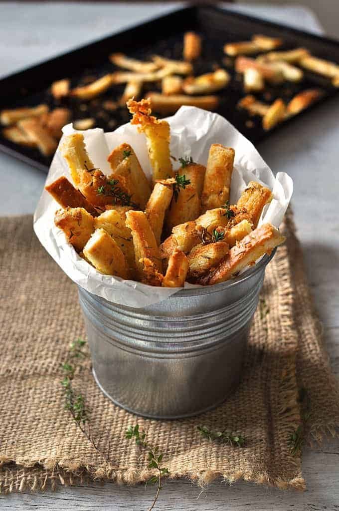 Parmesan Thyme Bread Crust Snacks in a silver bucket