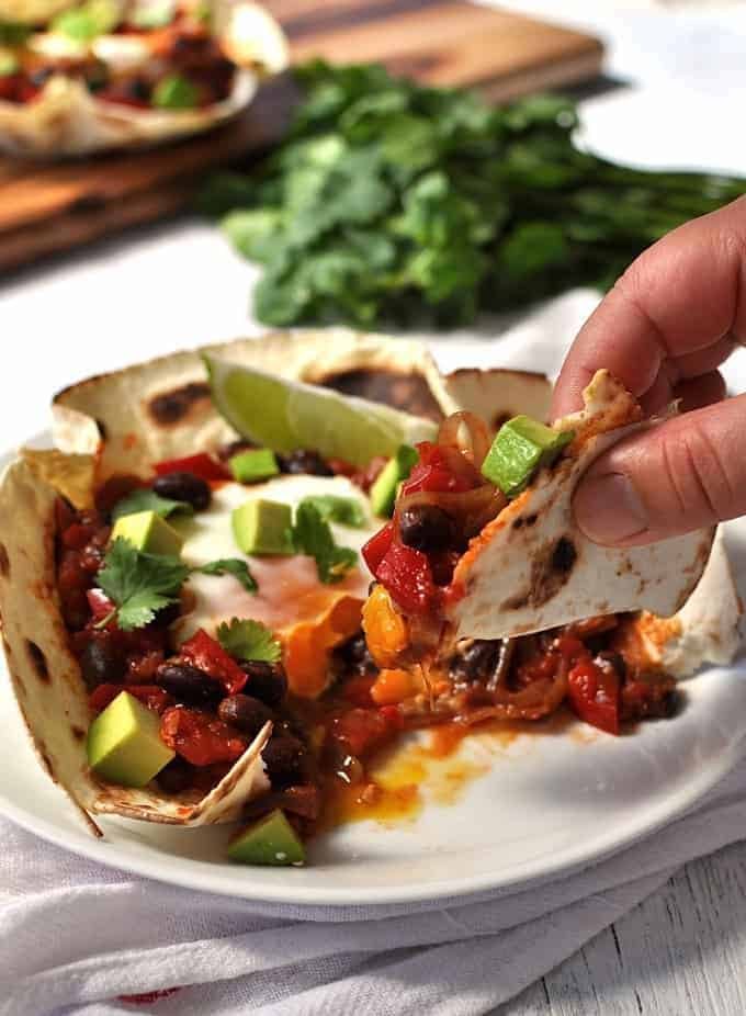 Tortilla bowls that are perfect for tearing bits off to scoop up the tomato bean filling and egg! #mexican #breakfast #brunch #tortilla