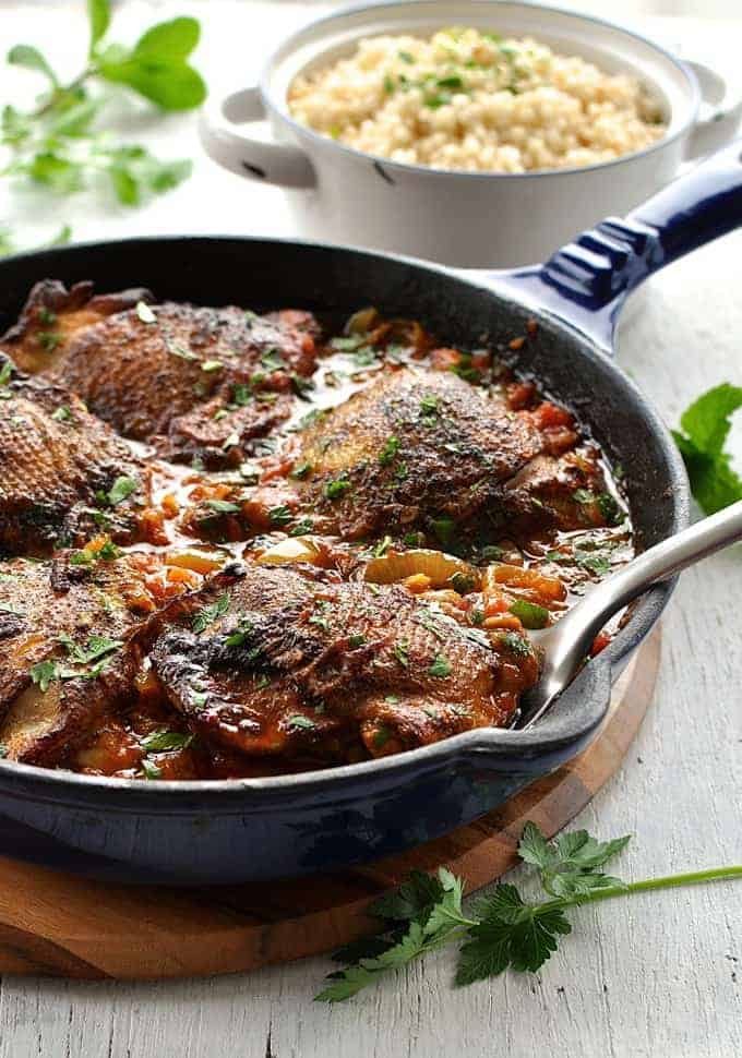 Syrian Chicken with Giant Couscous in background