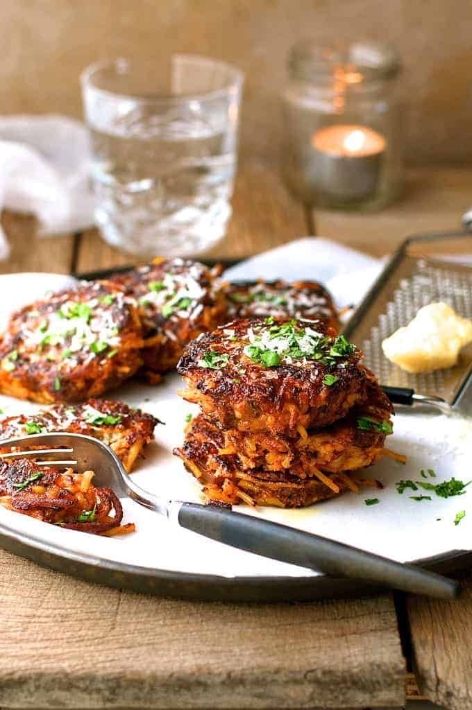 A pile of  Leftover Pasta Fritters with fork