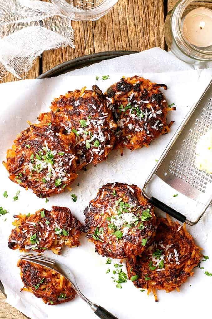 Overhead shot of  Leftover Pasta Fritters on white baking paper