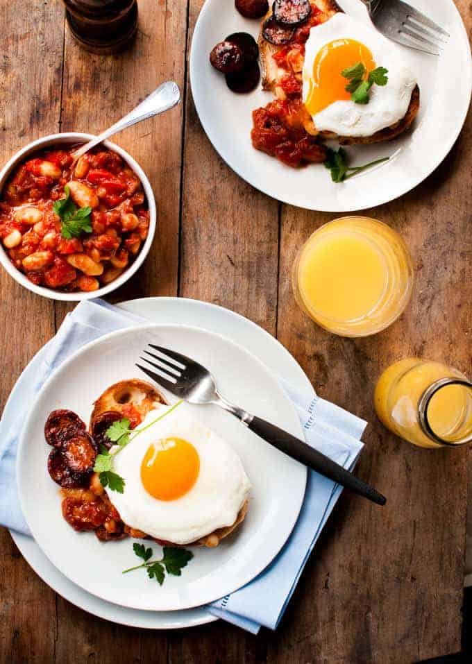 Chorizo Baked Beans on Toast breakfast with orange juice