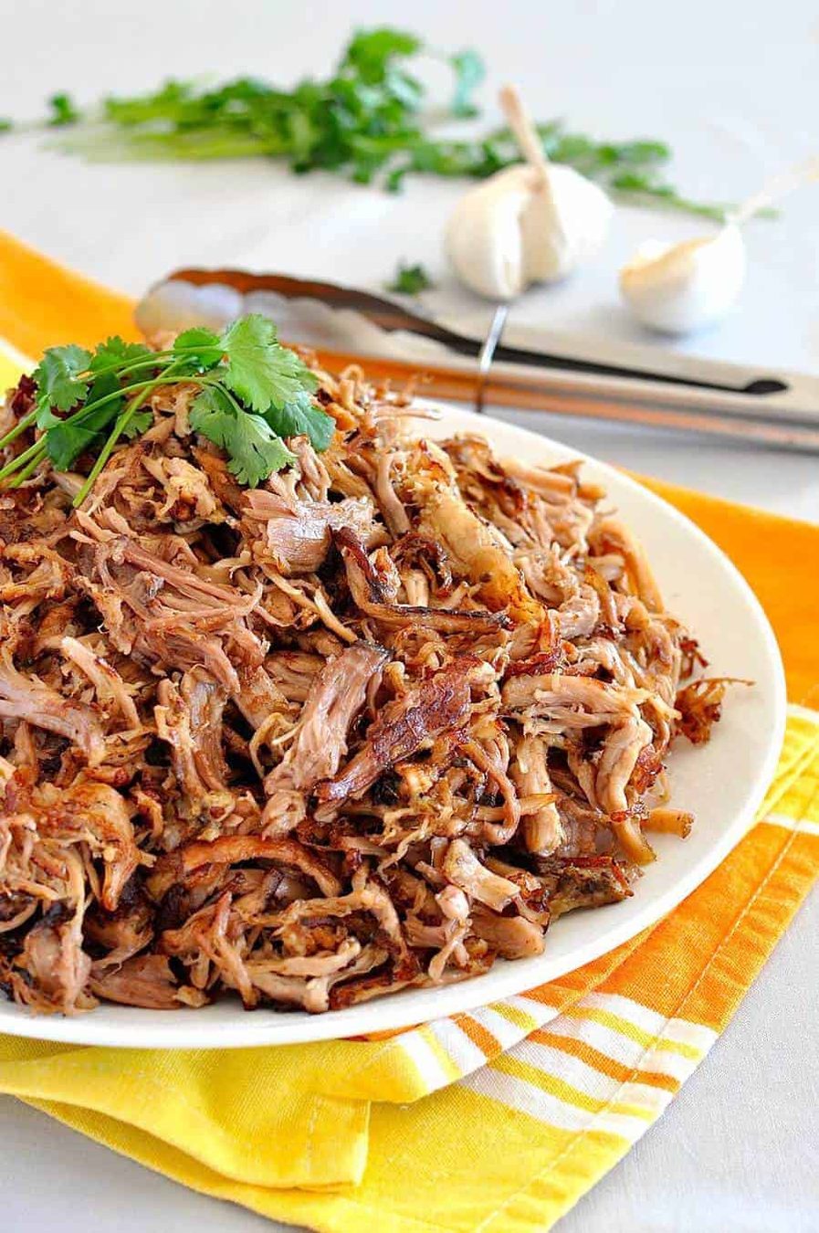 Juicy, moist Pork Carnitas with gorgeous golden brown crunchy bits! Incredibly easy, made in the slow cooker or oven. www.recipetineats.com