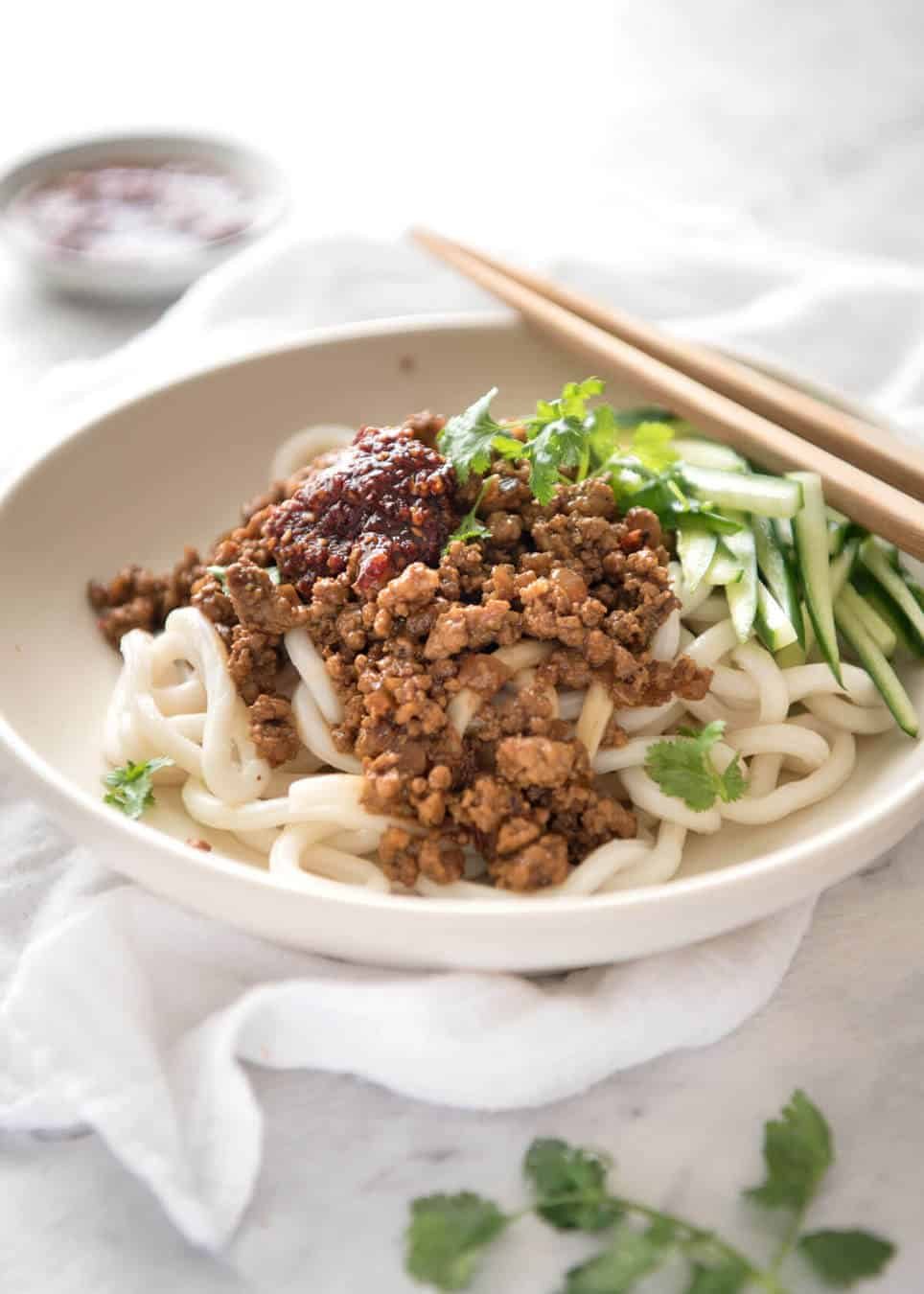 Chinese Pork with Noodles (Zha Jiang Mian) - Super quick and super tasty, affectionally known as "Chinese Bolognese". The pork is savoury with a touch of heat and spice, perfect mixed through noodles! www.recipetineats.com