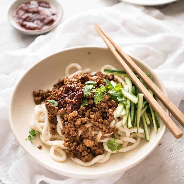 Chinese Pork with Noodles (Zha Jiang Mian) - Super quick and super tasty, affectionally known as "Chinese Bolognese". The pork is savoury with a touch of heat and spice, perfect mixed through noodles! www.recipetineats.com
