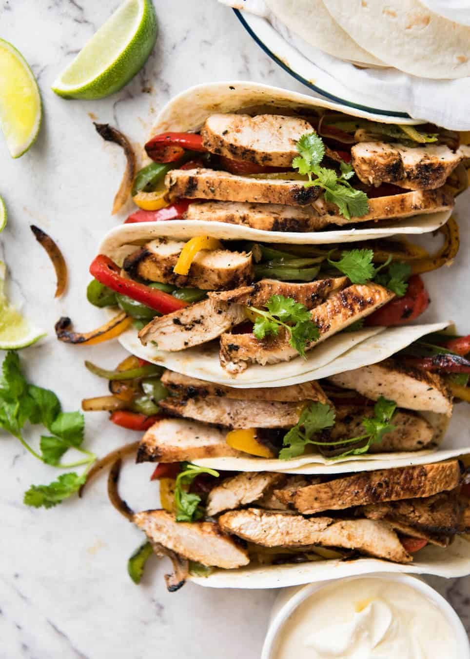 Juicy Chicken Fajitas beautifully seasoned with a homemade Fajita Seasoning. recipetineats.com