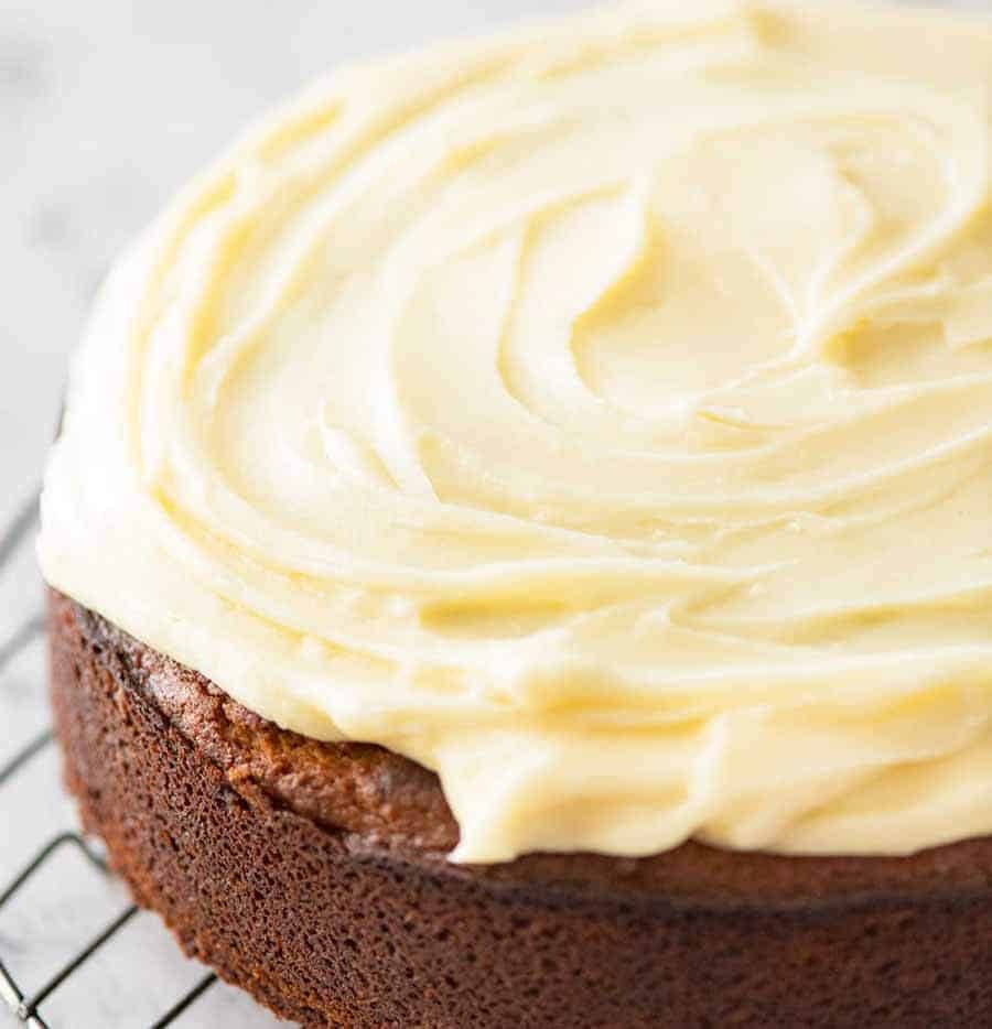 Lemon Cake with Cream Cheese Frosting on a rack