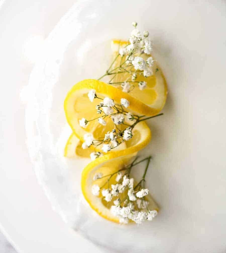 Close up of Lemon Cake decorations using lemon slices and flowers