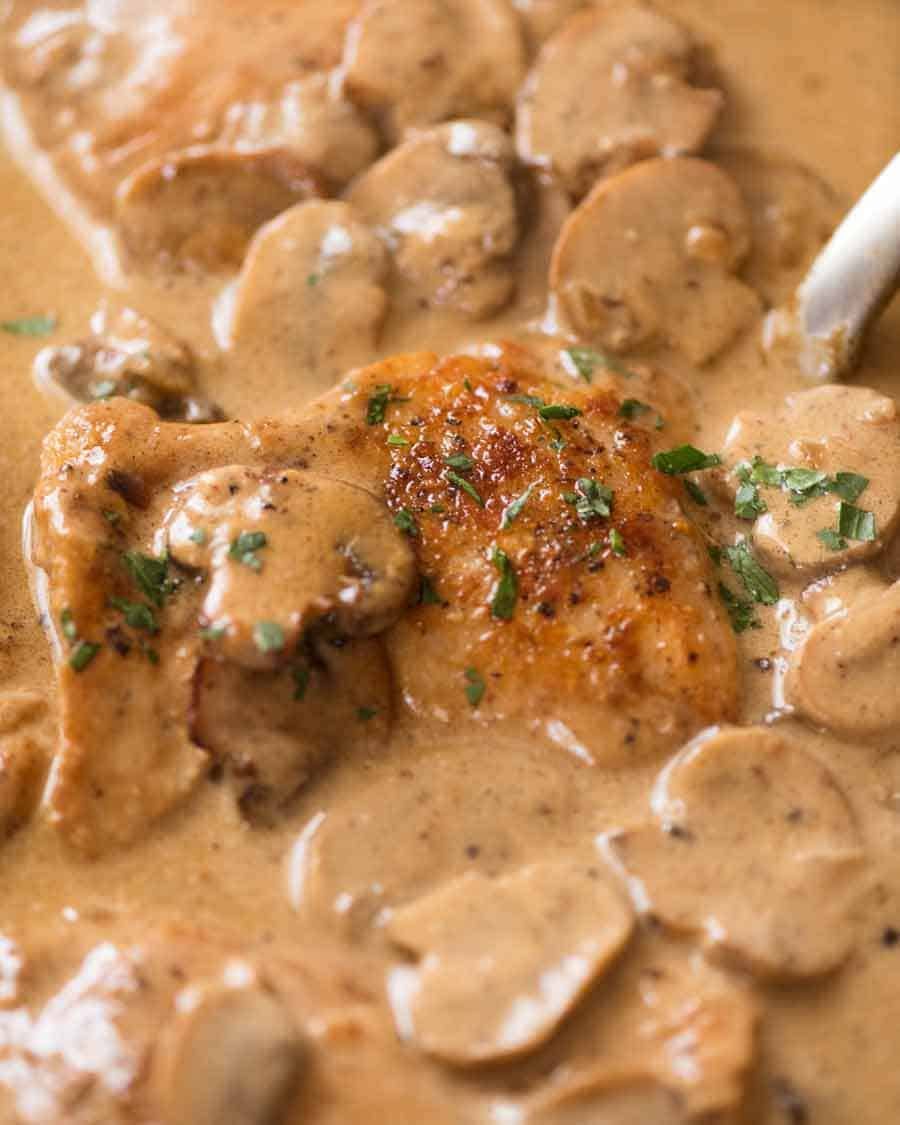 Close up of Chicken Stroganoff - golden seared chicken smothered in a creamy mushroom gravy