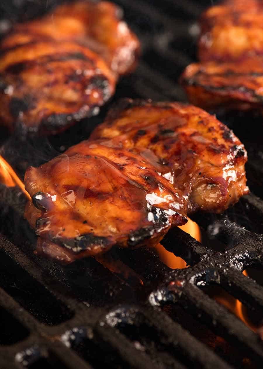 Sticky chicken being grilled on the BBQ