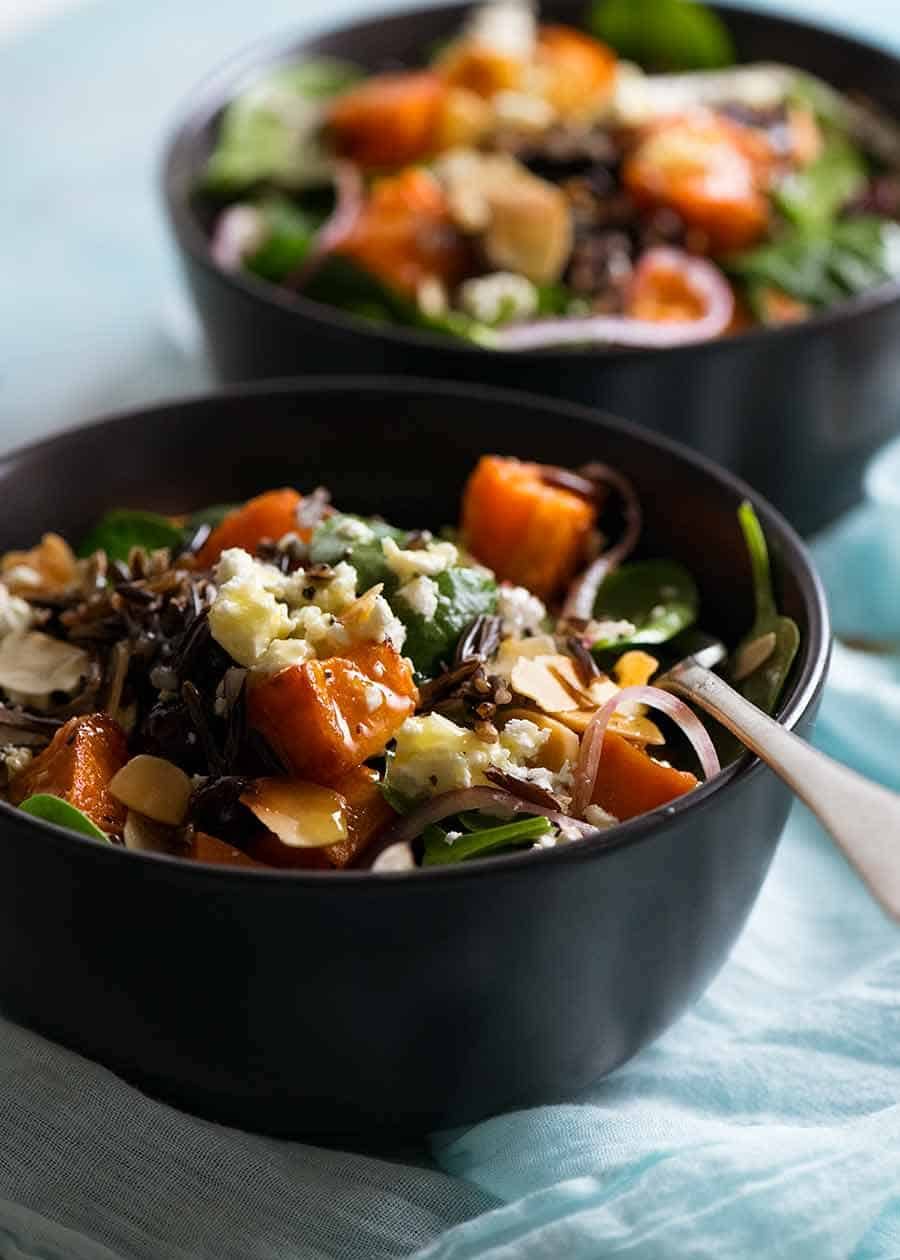 Two bowls of Sweet Potato Salad with Honey Lemon Dressing, ready to be eaten