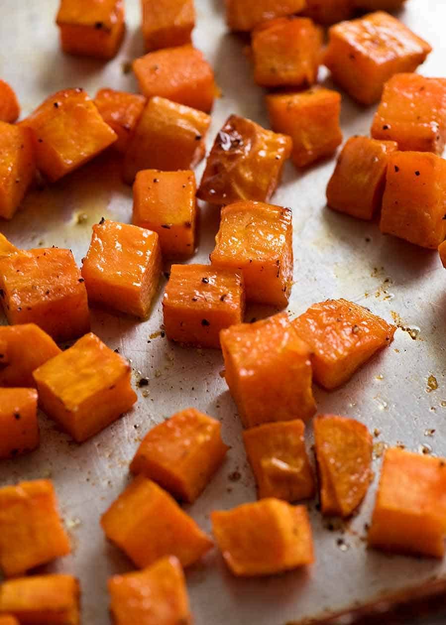 Roasted Sweet Potato Cubes on a tray, fresh out of the oven