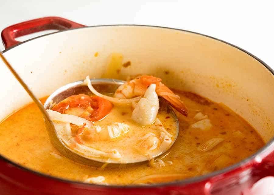 Pot with creamy Tom Yum Soup, fresh off the stove