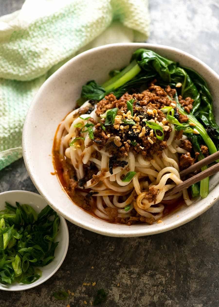 Dan Dan Noodles in a bowl, ready to be eaten