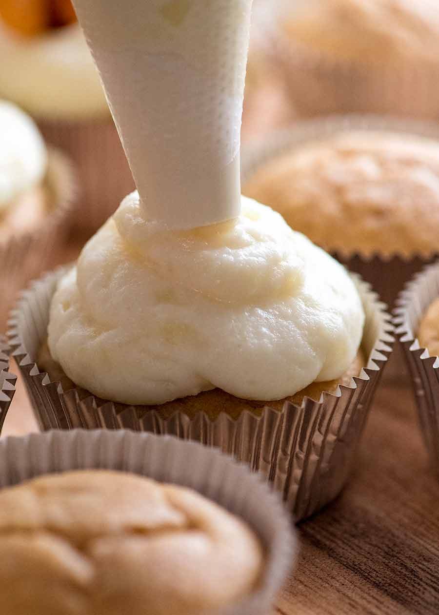 Piping dog friendly frosting on pupcakes