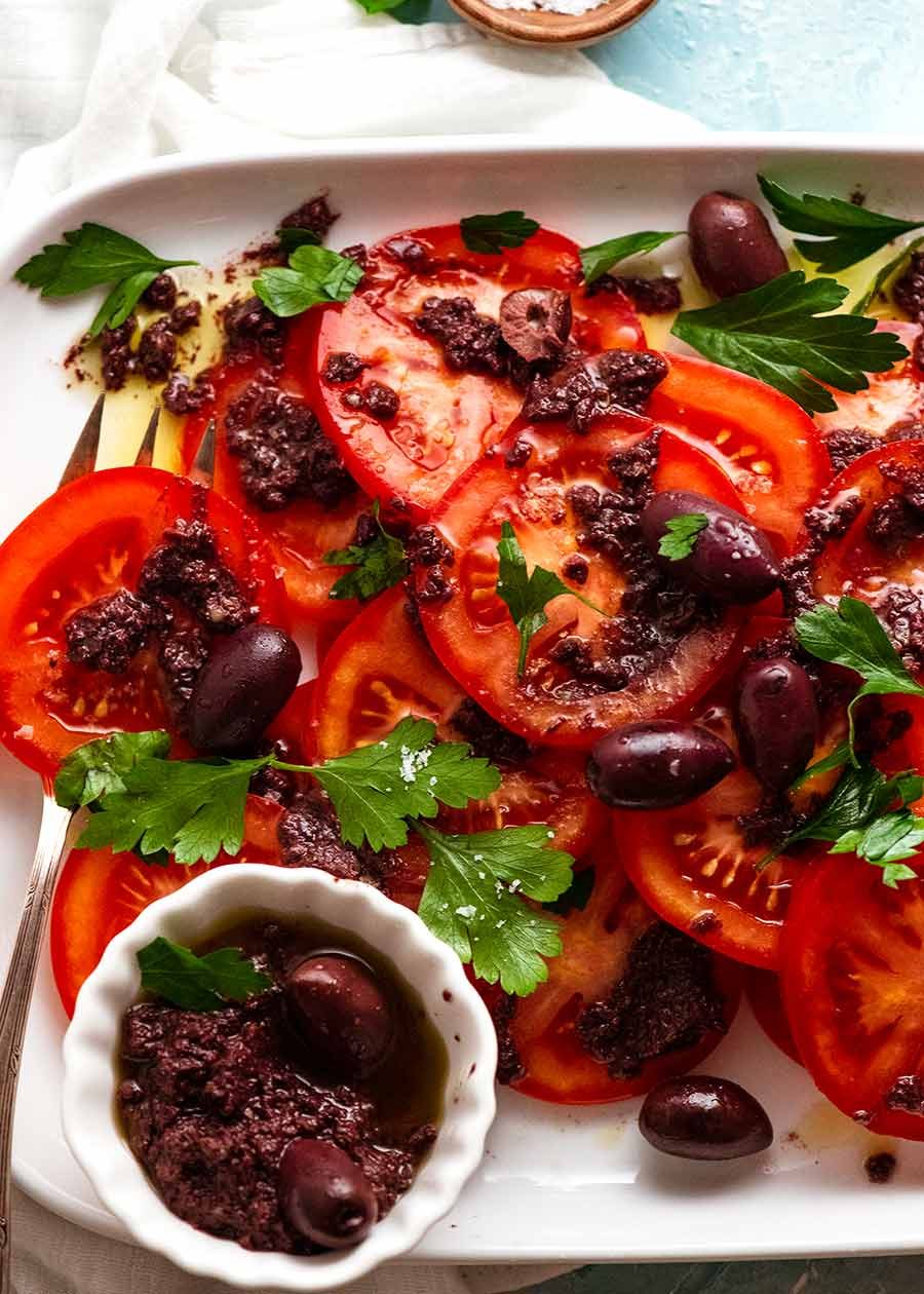 Tomato Salad with Olive Tapenade on a platter
