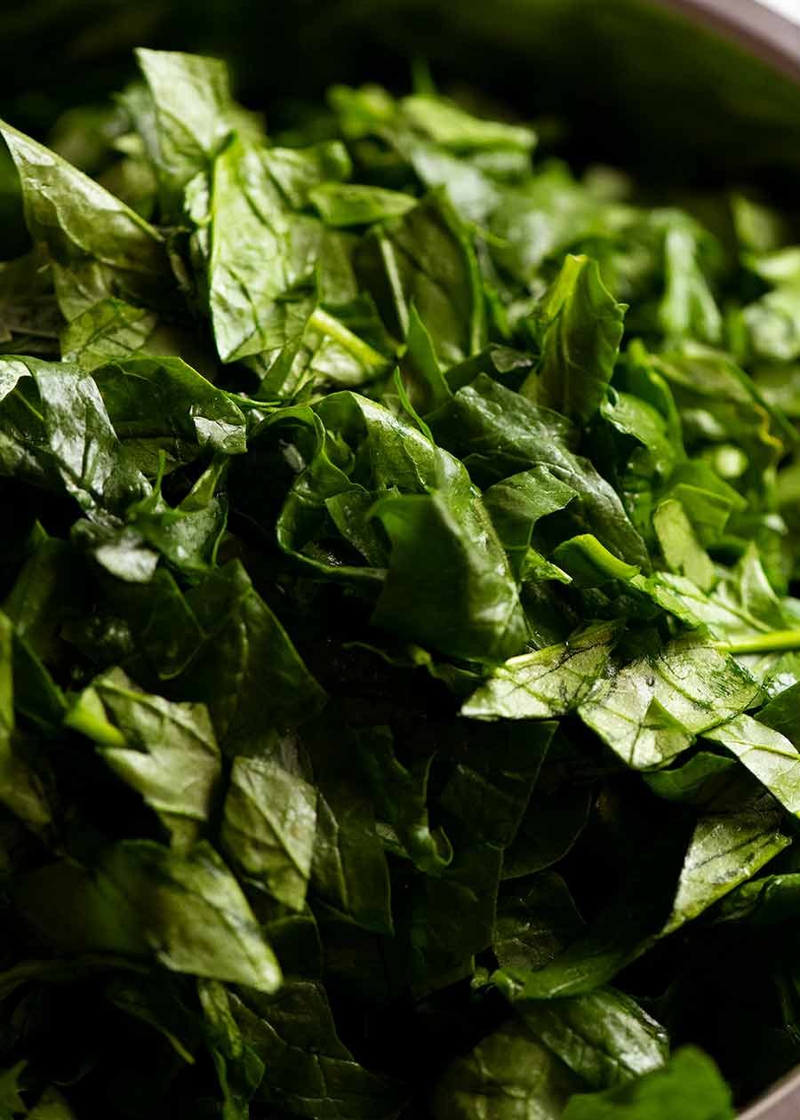 Bowl of chopped fresh spinach for Palak Paneer