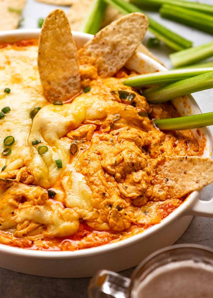 Close up of Hot Buffalo Chicken Dip being devoured at a party