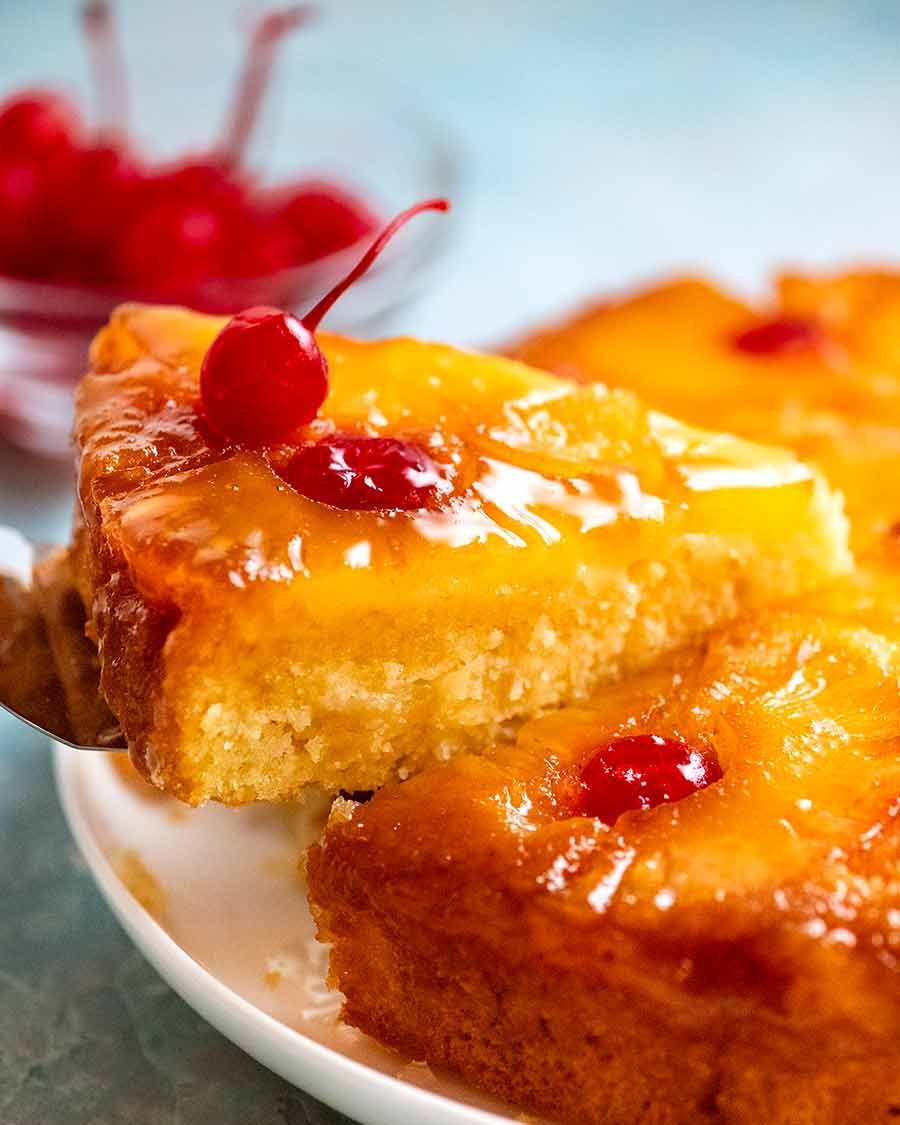 Picking up a slice of Pineapple Upside Down Cake