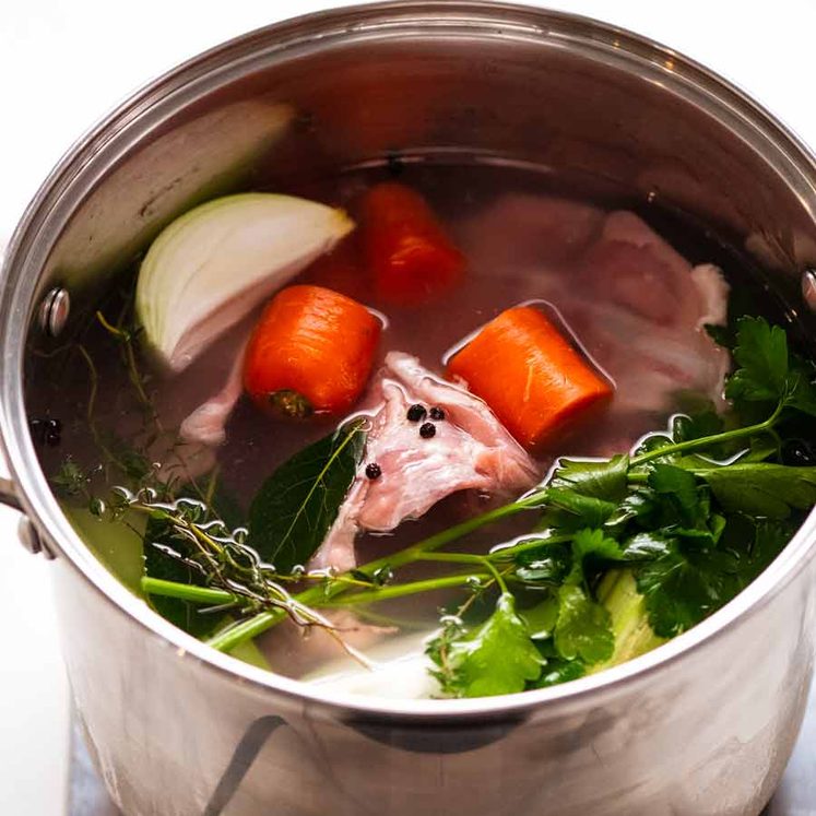 Large pot of Homemade chicken stock being made