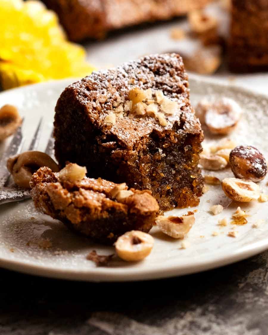 Close up of slice of Olive oil hazelnut cake